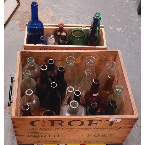 219 - Mixed Glass Bottles in 2 Wooden Crates