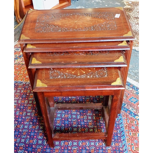 254 - Nest of 4 Tables with Carved Top and Brass Inlay