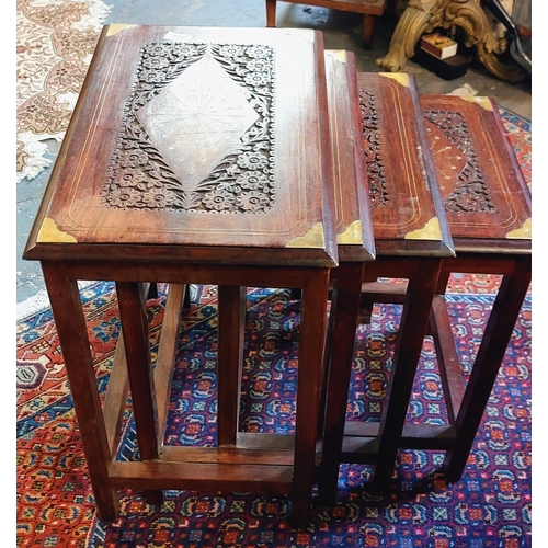 254 - Nest of 4 Tables with Carved Top and Brass Inlay