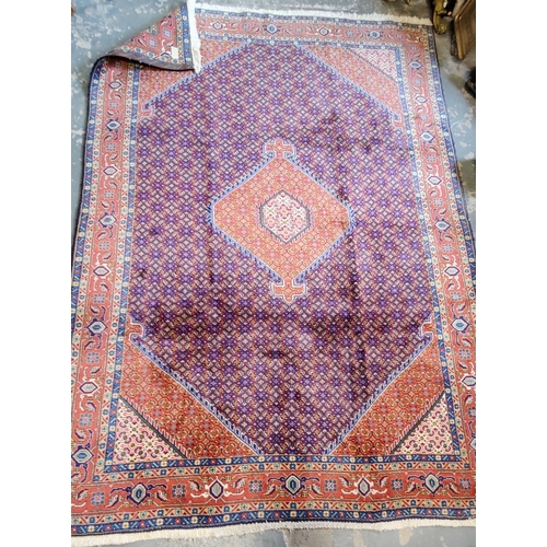 269 - Red & Blue Hand Knotted Iranian Rug - C. 307cm x 204cm