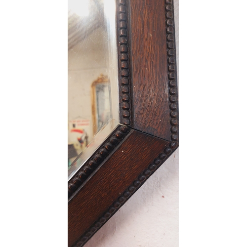 279 - Octagonal Oak Frame Bevelled Mirror - C. 59cm