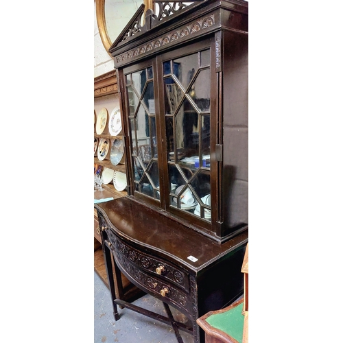 28 - Edwardian Carved Mahogany Astral Glazed Display Cabinet with Bow Front, 2 Drawers Sitting Over X-Fra... 