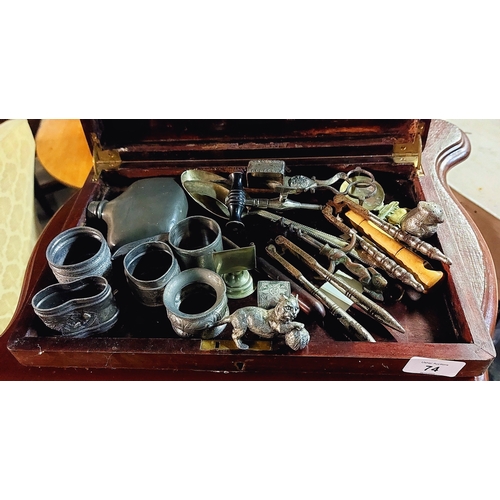 74 - Mahogany Case with Silver Plate Collectible Objects - Nutcrackers etc
