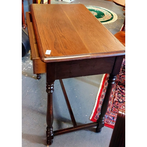 313 - Oak Hall Table with Carved Drawer on Stretcher Base