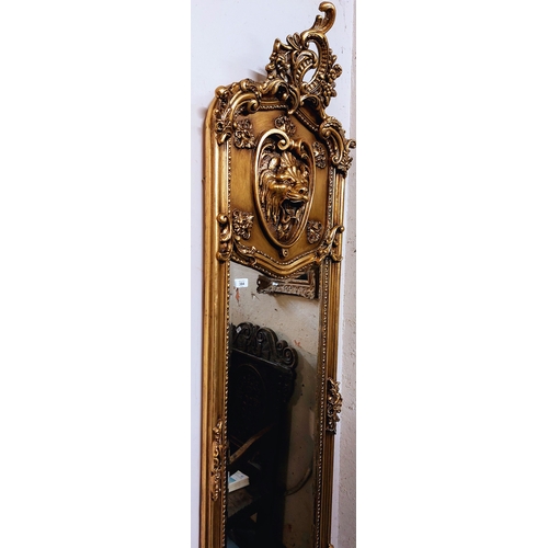 384 - Narrow Gilt Decorative Lion Head Bevelled Mirror - C. 180cm H x 49cm W