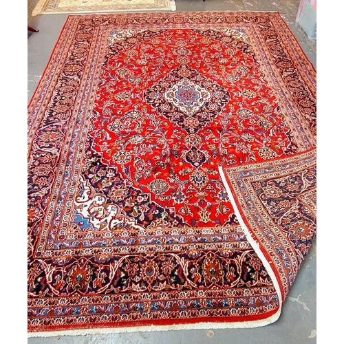 391 - Large Red Hand Knotted Rug - C. 340cm x 240cm