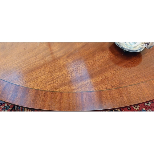 533 - Oval Mahogany Crossbanded Coffee Table on a Splayed Base with Brass Castors - C. 122cm W x 84cm D x ... 