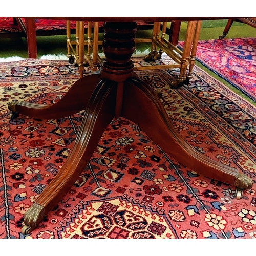 533 - Oval Mahogany Crossbanded Coffee Table on a Splayed Base with Brass Castors - C. 122cm W x 84cm D x ... 