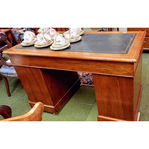 576 - Neat Mahogany Gilt Tooled Leather Top Writing Desk with 9 Drawers sitting on Brass Castors - C. 122c... 