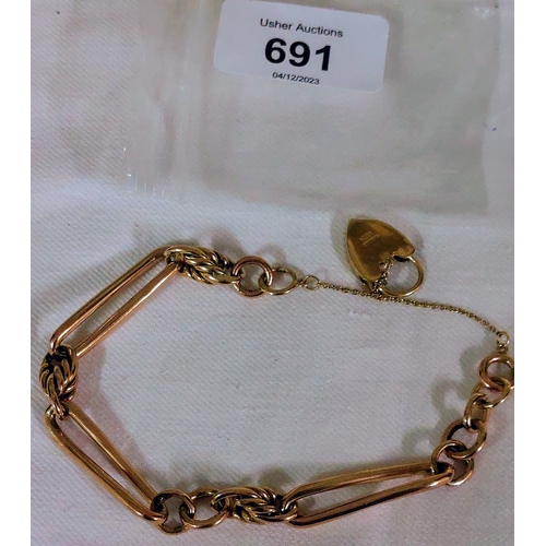 691 - 9ct Antique Knot & Trombone Link Bracelet - 32 grams