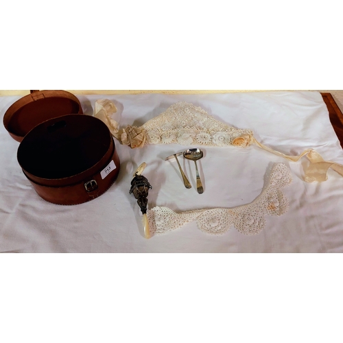 713 - Leather Case with Christening Set inc Lace Bonnet, Scarf, and A Birmingham Silver Rattle/Soother, Sp... 