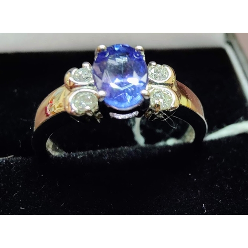 642 - 18 Ct Gold Tanzanite & Diamond Ring - Size N (16.9mm)