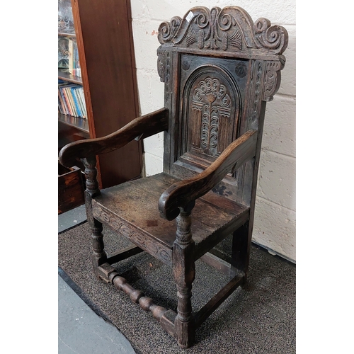 100 - C. 18th Century Carved Oak Panel Back Armchair