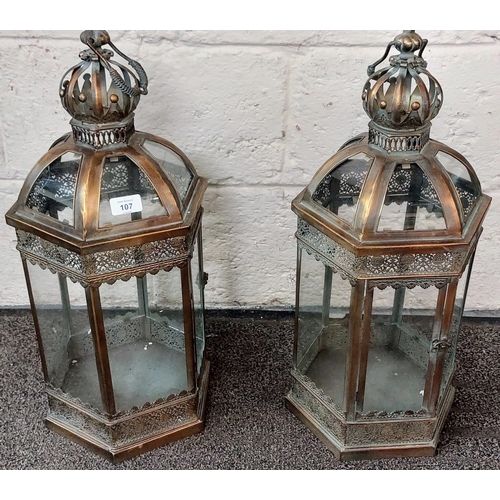 107 - Pair of Glass and Pierced Metal Lanterns - C. 64cm H