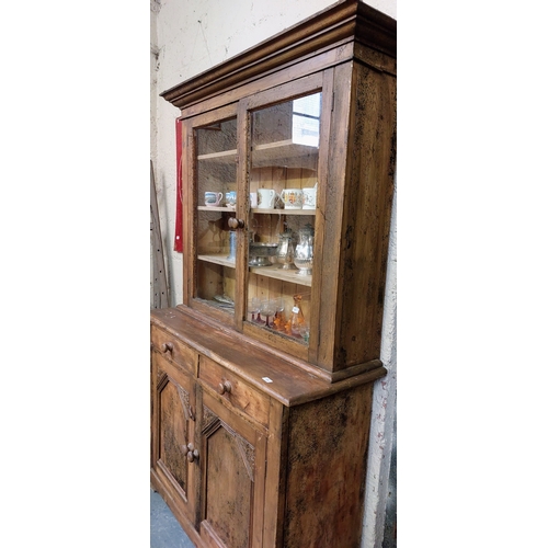 128 - Waxed Pine Kitchen Cupboard with Glazed Doors on Top and Carved Panel Doors on Bottom - C. 125cm W x... 