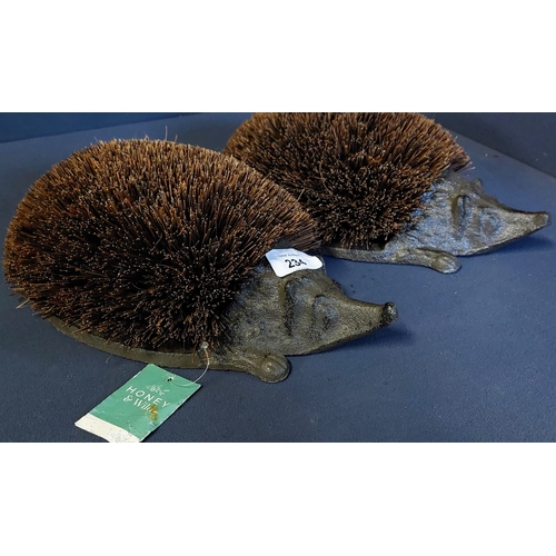 234 - 2 Hedgehog Figure Metal Boot Scrapers