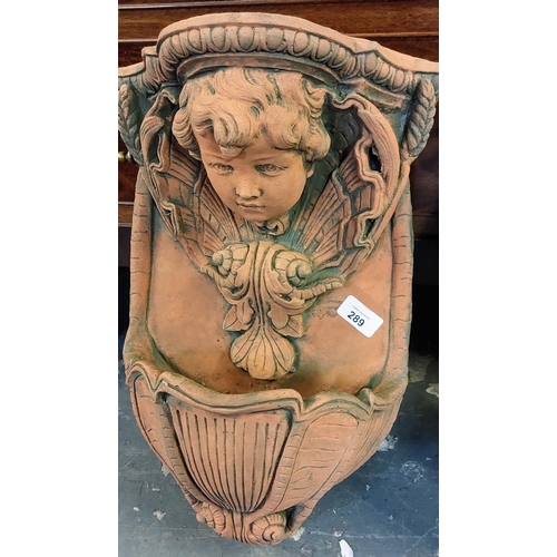 289 - Pair of Wall Mount Terracotta Cherub Figure Fonts