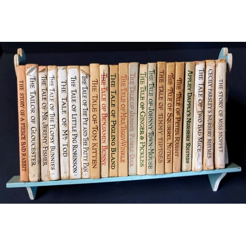 418 - Set of Beatrix Potter Books on Bookstand