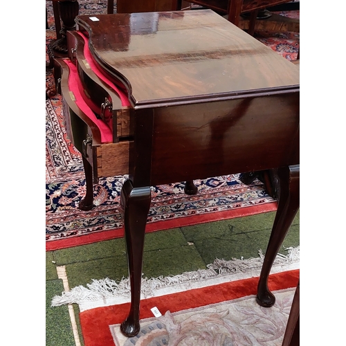 586 - Mahogany Serpentine Front Canteen Table with Sheffield Cutlery - C. 69cm W x 50cm D 78cm H