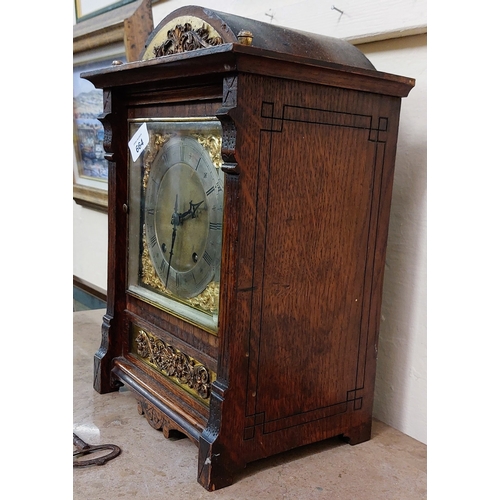 664 - Oak and Brass Domed Top Bracket Clock (with key) - C. 38cm H