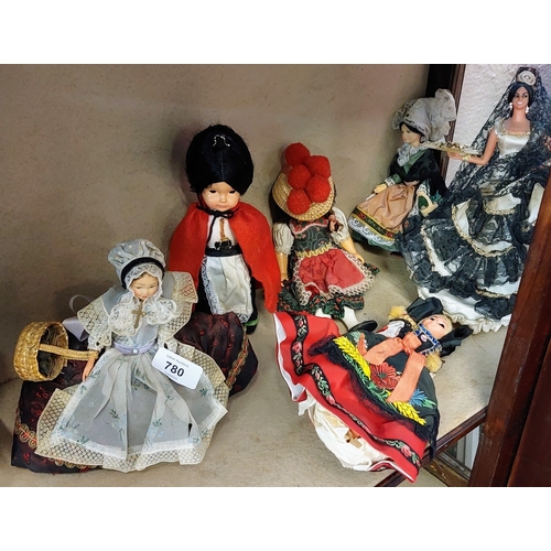 780 - 9 Vintage Costume Dolls