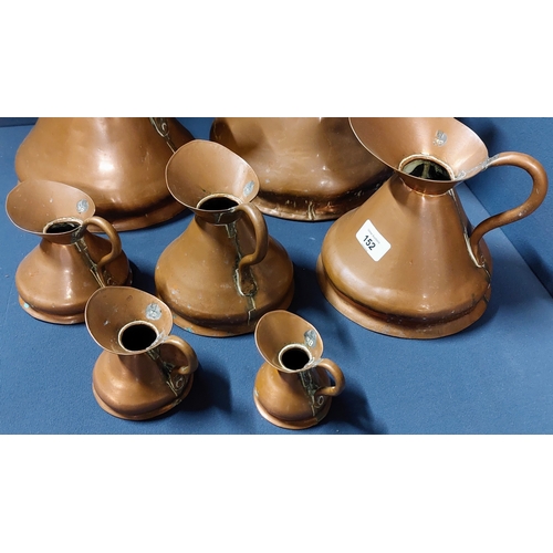 152 - Set of 7 Graduated Copper Jugs