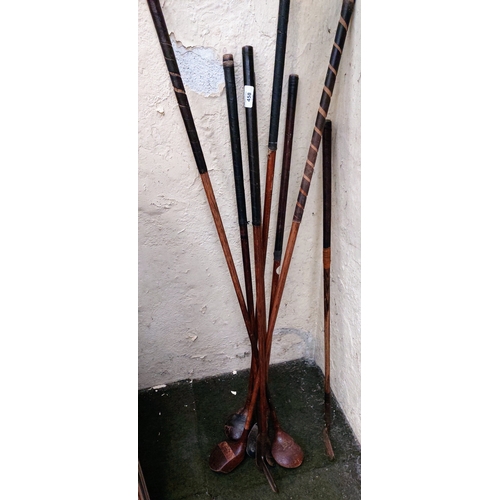 458 - 7 Vintage Wooden Handle Golf Clubs - Thomson, St Andrews, Elvery & Co Dublin