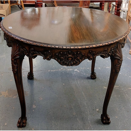 125 - Circular Mahogany Occasional Table; Highly Carved in the Chippendale Style with Paw Feet - C. 100cm ... 