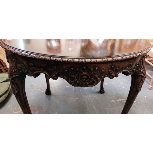 125 - Circular Mahogany Occasional Table; Highly Carved in the Chippendale Style with Paw Feet - C. 100cm ... 