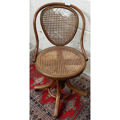 77 - Neat Bentwood Swivel Chair