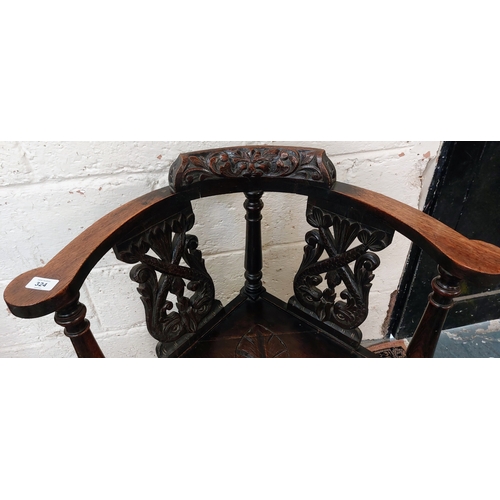 324 - 19th Century Highly Carved Oak Corner Armchair