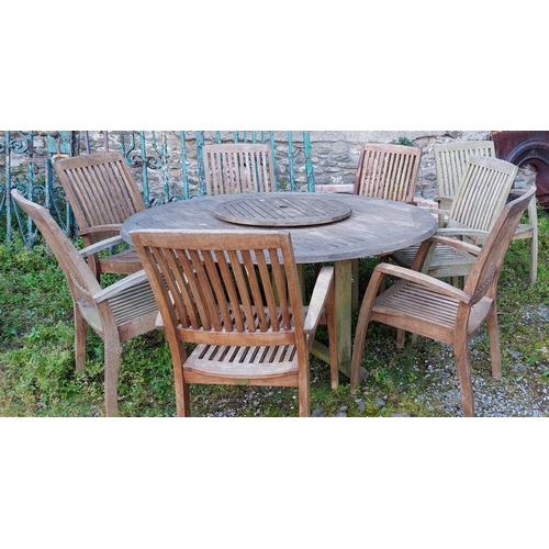 509 - Large Round Teak Garden Table and 8 Armchairs by 