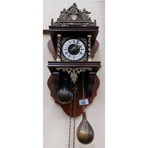 550 - Modern Wall Clock with Brass Weights and Atlas Figure Bell Chime