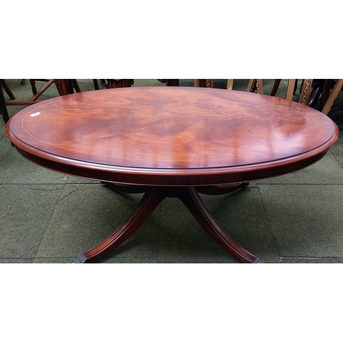 612 - Mahogany Inlaid Oval Coffee Table on a Splayed Leg Base and Brass Paw Castors - C. 122cm W x 70cm D ... 