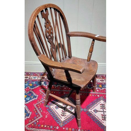 151 - Oak Wheel Back Armchair