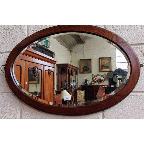 53 - Oval Oak Frame Bevelled Mirror - C. 78cm x 51cm