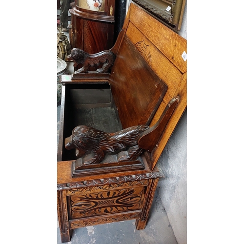 506 - Oak Highly Carved Monks Bench with Lion Carved Armrests - C. 107cm W x 46cm D