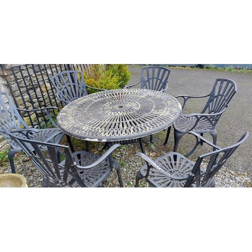 551 - Round Black Metal Garden Table and 6 Armchairs - C. 122cm W