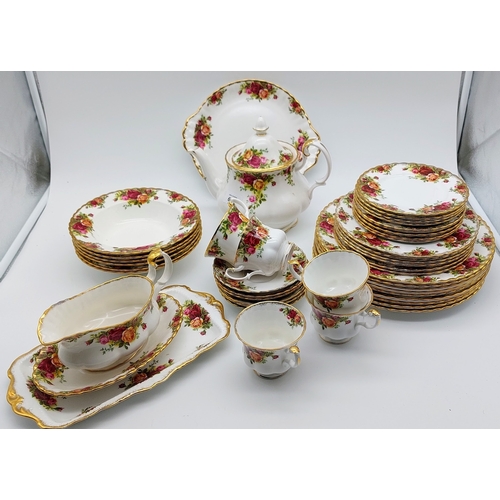 634 - Country Rose Dinnerware - C. 45 Pieces