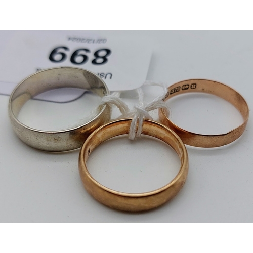 899 - 2 x 9ct Gold Band Rings & a Sterling Silver Band Ring