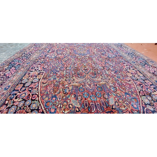 1061 - Red and Blue Wool Rug - C. 265cm x 164cm