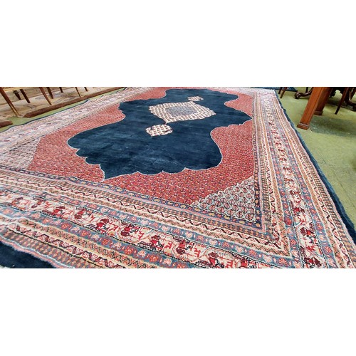 717 - Blue & Red Wool Rug - C. 310cm x 217cm