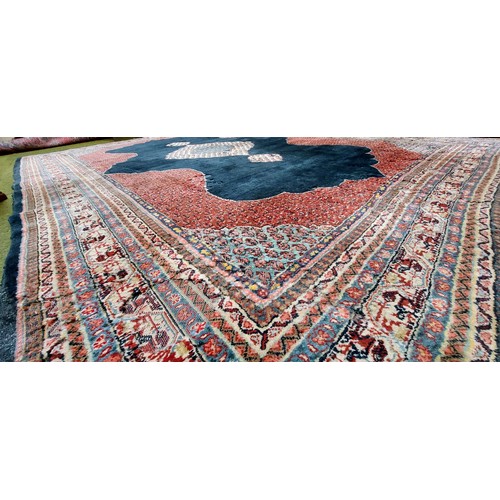 717 - Blue & Red Wool Rug - C. 310cm x 217cm