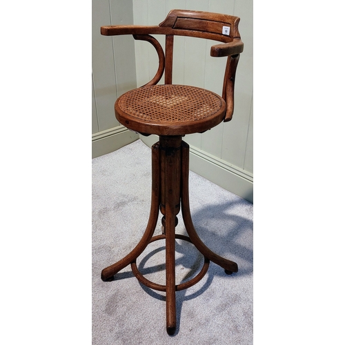 69 - Neat Size Swivel Bentwood Stool with Bergere Seat