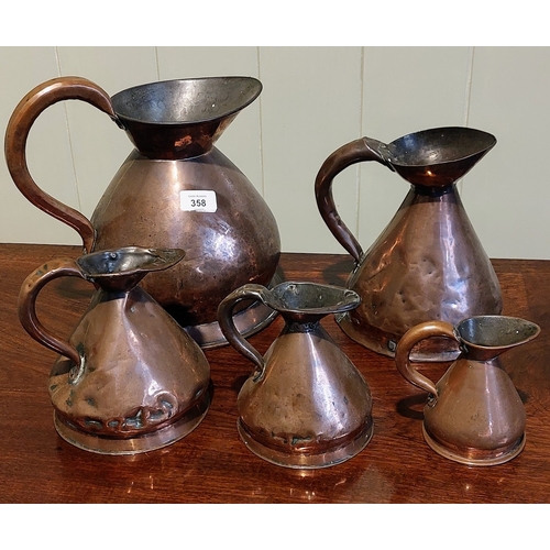 358 - Set of 5 Graduated Copper Jugs