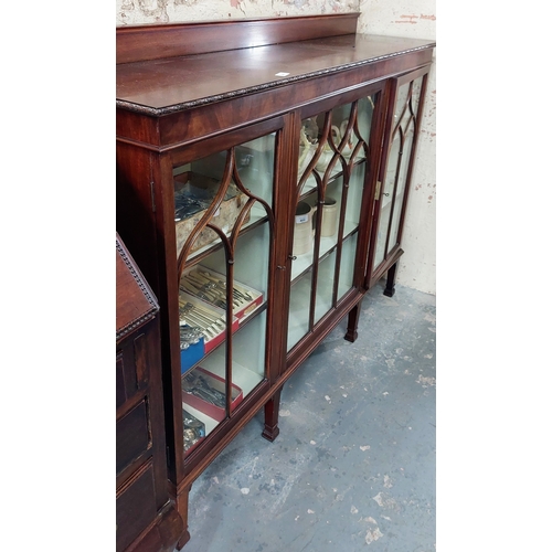 411 - Mahogany 3 Door Astral Glazed Bookcase - C. 137cm W x 34cm D x 105cm H