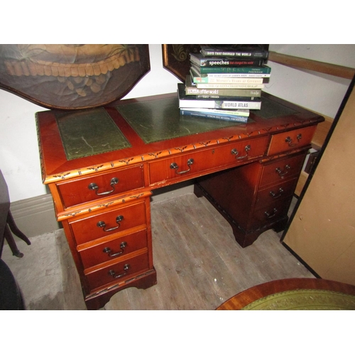 1075 - Walnut Pedestal Desk with Inset Green Tooled Leather Top above Nine Drawers Approximately 3ft 4 Inch... 