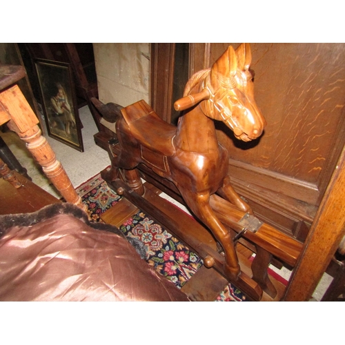 1110 - Carved Mahogany Childs Rocking Horse Approximately 4ft Wide