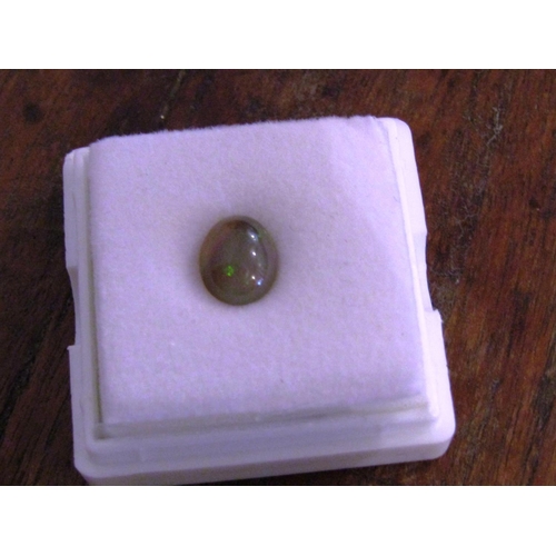 243 - Cabochon Opal of Approximately Four Carats