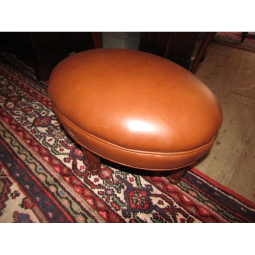 263 - Tan Leather Upholstered Oval Form Foot Stool